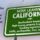 Leaving California sign showing state's problems